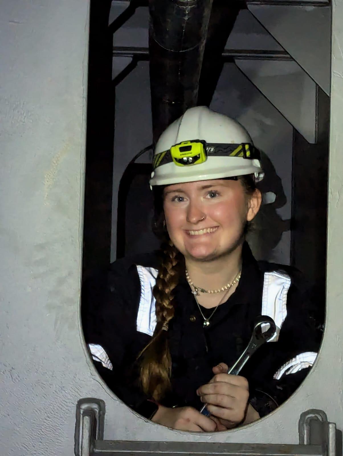 A woman in a hard hat